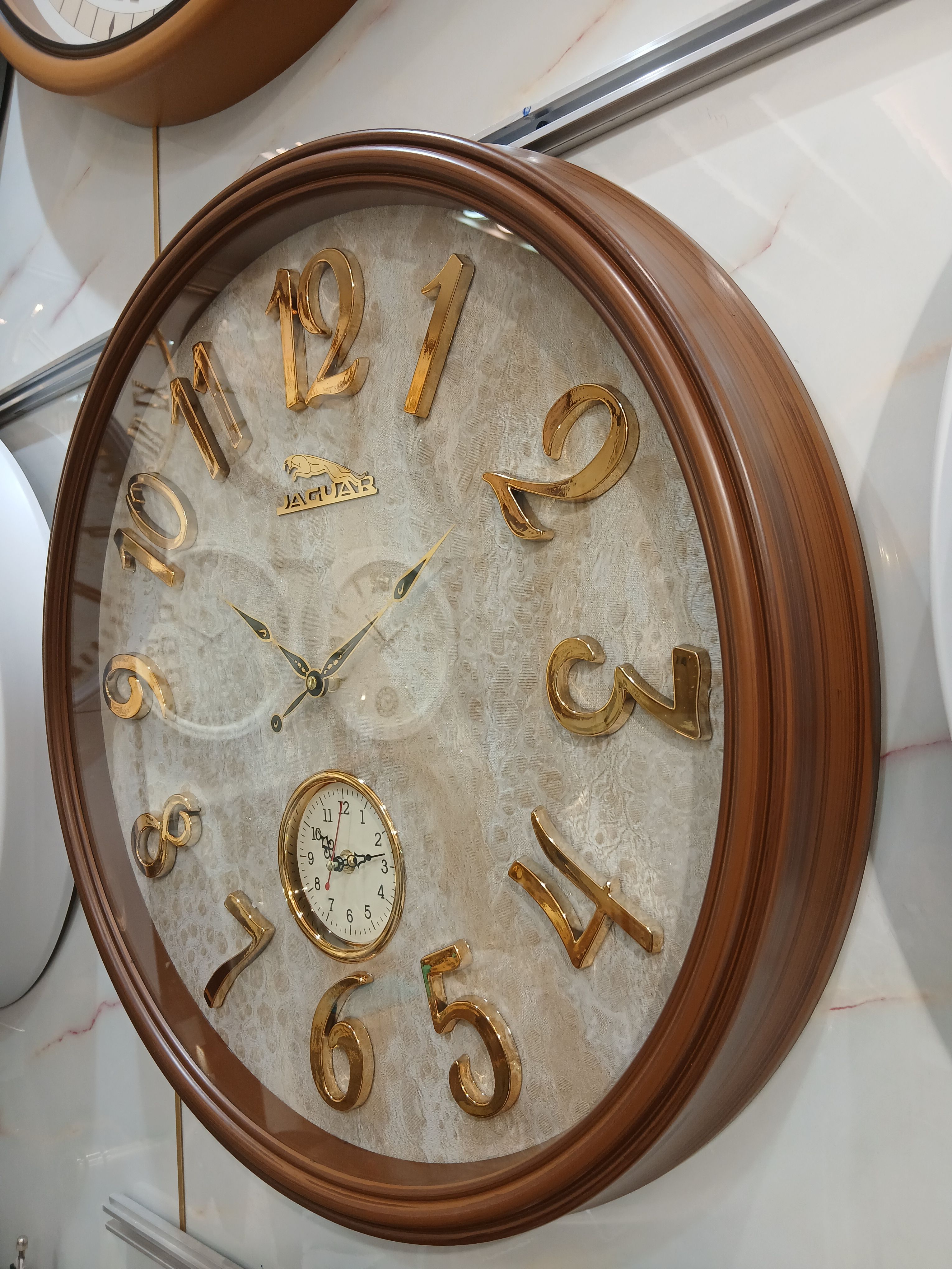ساعت دیواری دوموتوره آرام گرد جگوار