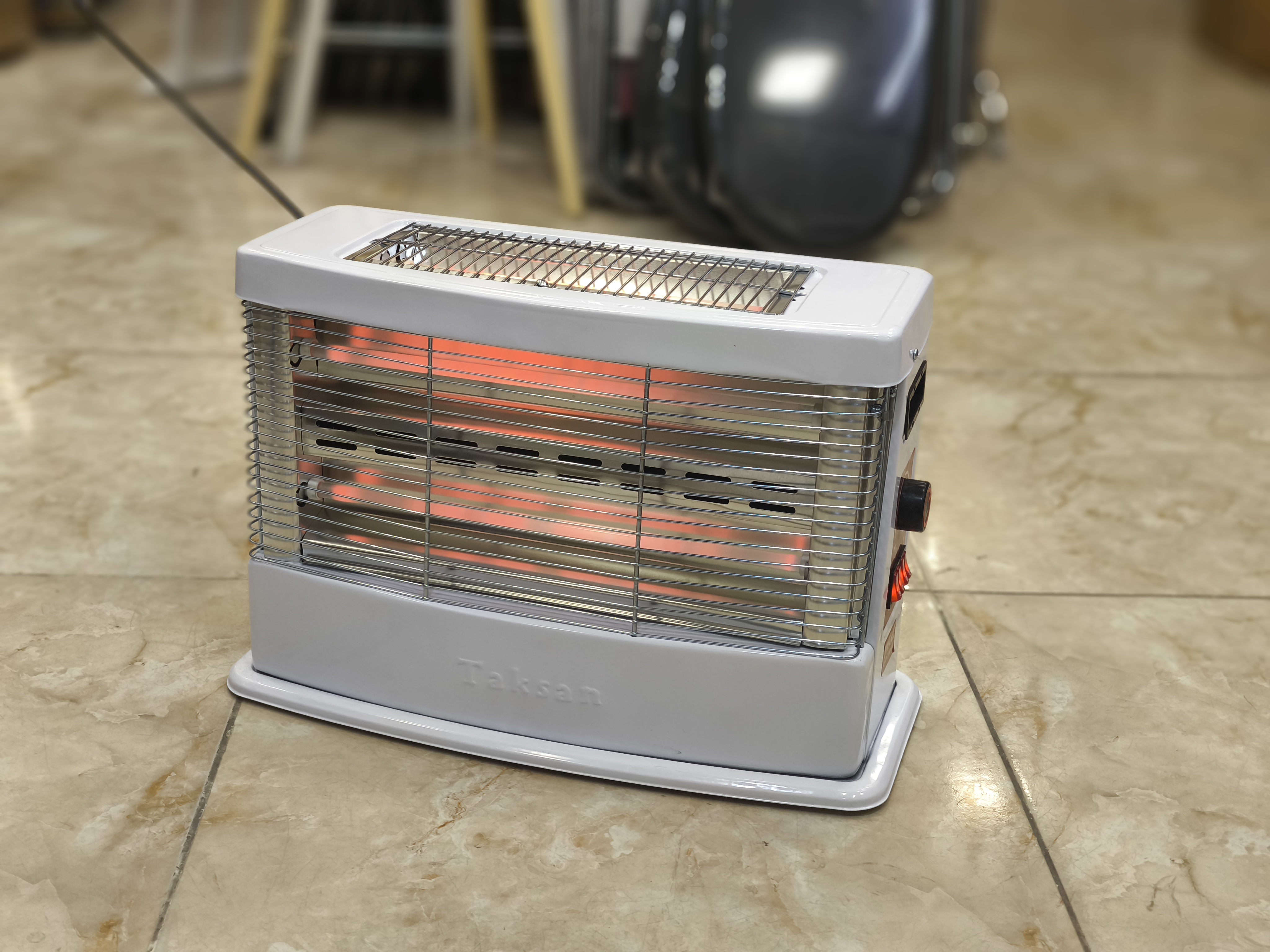 بخاری برقی مدل دوبعدی چهار شعله ترموستات دار و فن دار تکسان